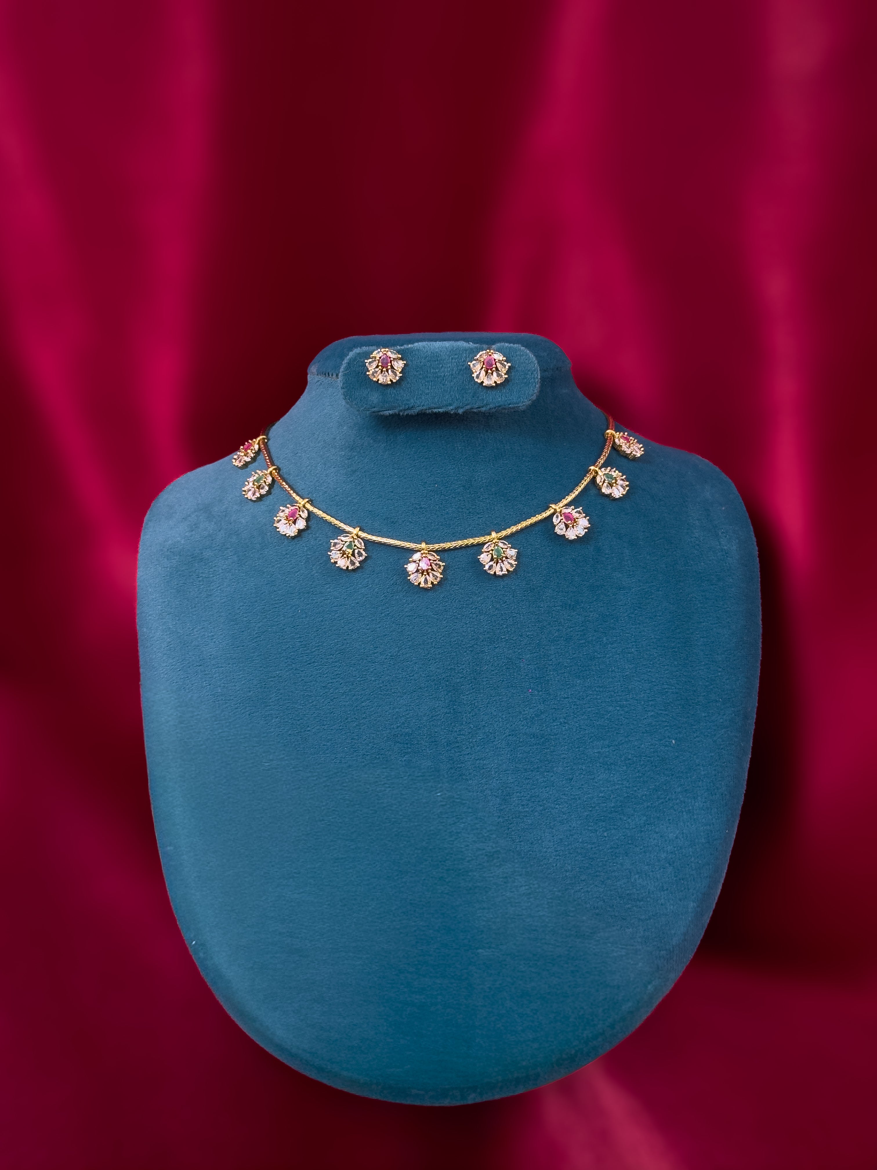 Multi pendant necklace with studs